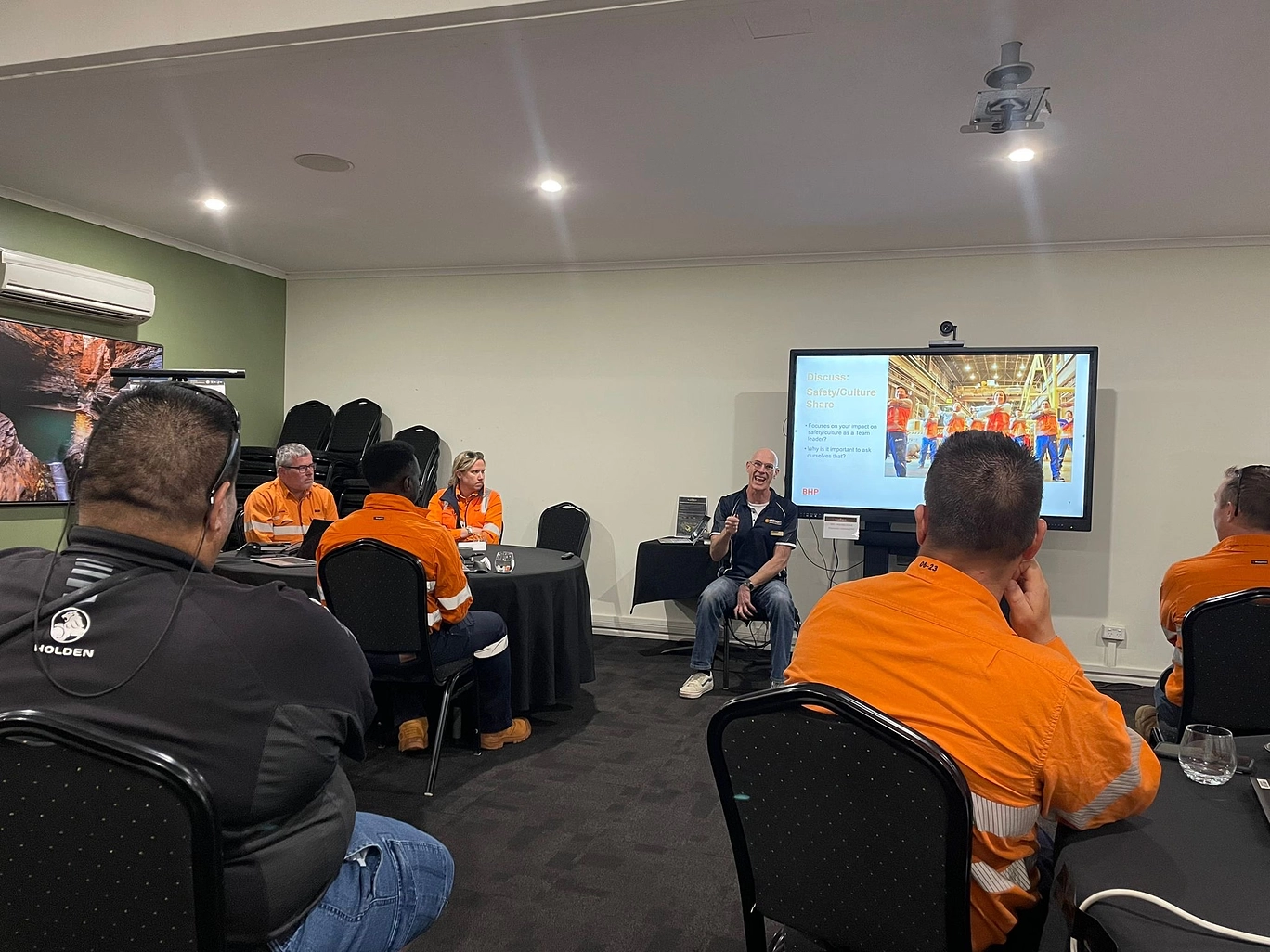 Leaders collaborating in a safety leadership workshop session